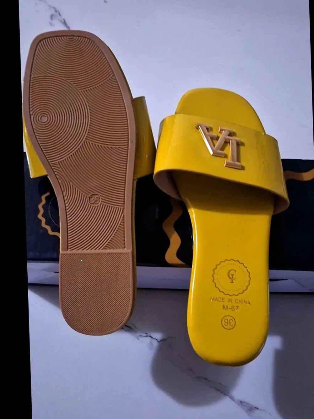 Yellow Slide Sandals with Gold Accent Logo